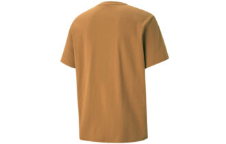 Camiseta cruzada PUMA x Kidsuper Studios con letras bordadas, color liso, deportiva, cuello redondo, manga corta, amarilla
