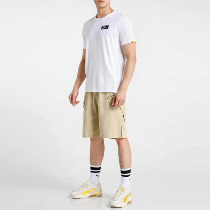Camiseta PUMA x Randomevent «Blanca, negra y amarilla»