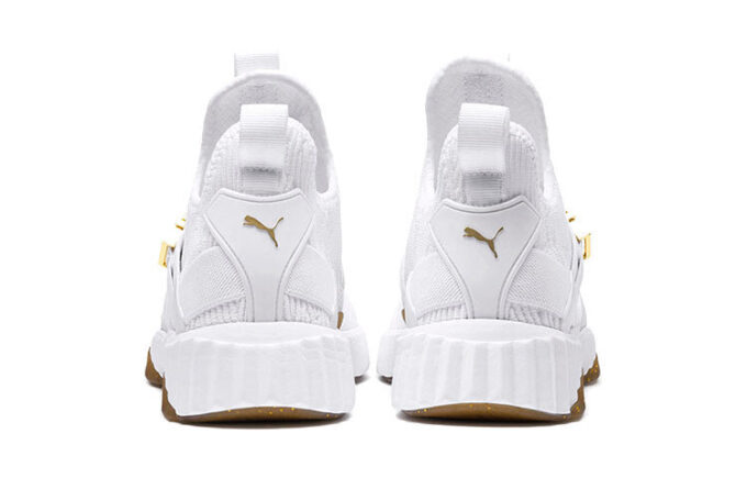 (Mujeres) Defy Varsity Mid «Blanco Dorado Metálico»