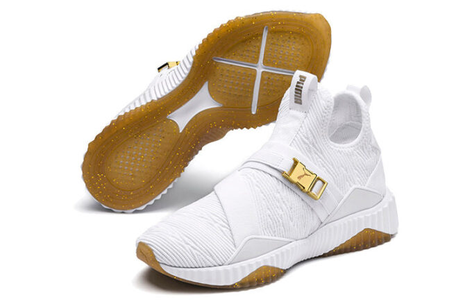 (Mujeres) Defy Varsity Mid «Blanco Dorado Metálico»