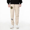 Pantalón deportivo de punto con insignia mixta «Beige»