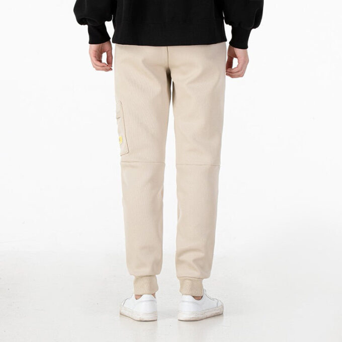 Pantalón deportivo de punto con insignia mixta «Beige»