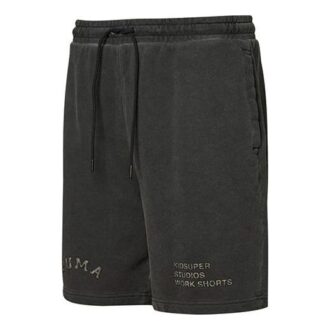 Pantalones cortos deportivos con cordón ajustable y bordado del alfabeto con logotipo cruzado de PUMA x Kidsuper Studios, color negro