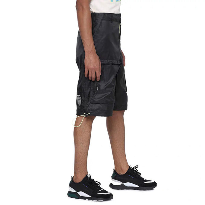 Pantalones cortos tejidos PUMA x Central Saint Martins «Negro y blanco»