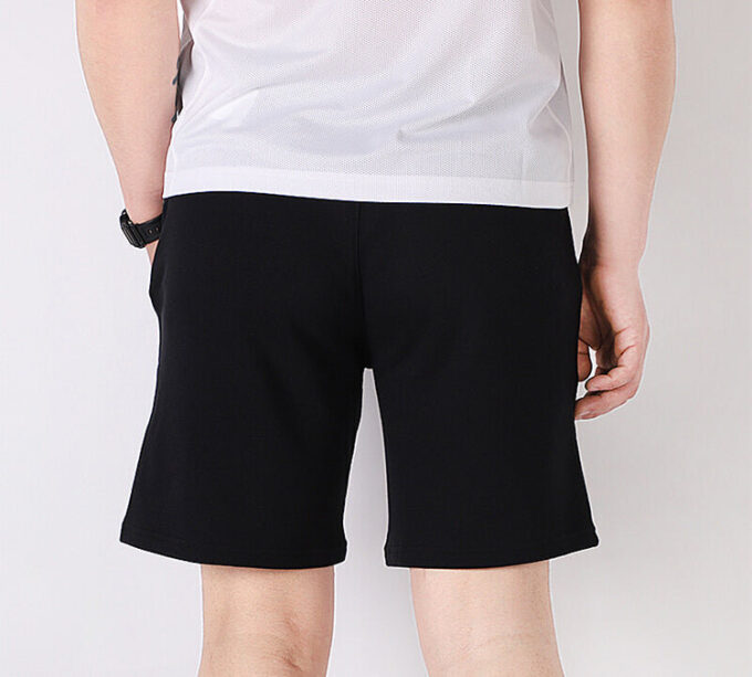 Pantalones cortos Worldhood de Tailored For Sport «Negro, Blanco y Naranja»