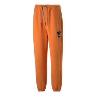 Pantalones deportivos PUMA x Ami «Naranja»