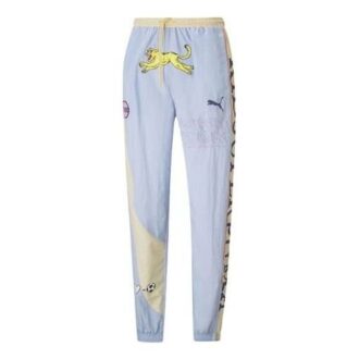 Pantalones deportivos PUMA x KIDSUPER Studios «Morado, amarillo y negro»