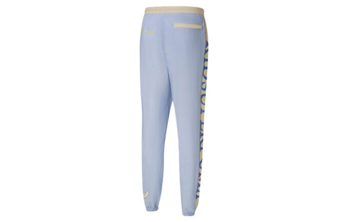 Pantalones deportivos PUMA x KIDSUPER Studios «Morado, amarillo y negro»