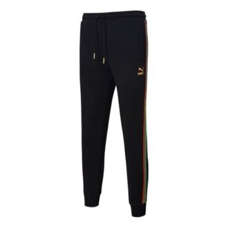 Pantalones deportivos Unity de Tailored For Sport «Negro Naranja»