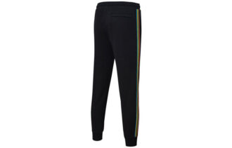 Pantalones deportivos Unity de Tailored For Sport «Negro Naranja»