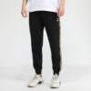 Pantalones deportivos Unity de Tailored For Sport «Negro Naranja»