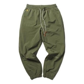Pantalones tejidos PUMA x Randomevent «Verde»