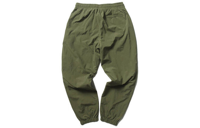 Pantalones tejidos PUMA x Randomevent «Verde»