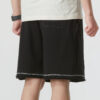Shorts con logo «Negro con costuras blancas»