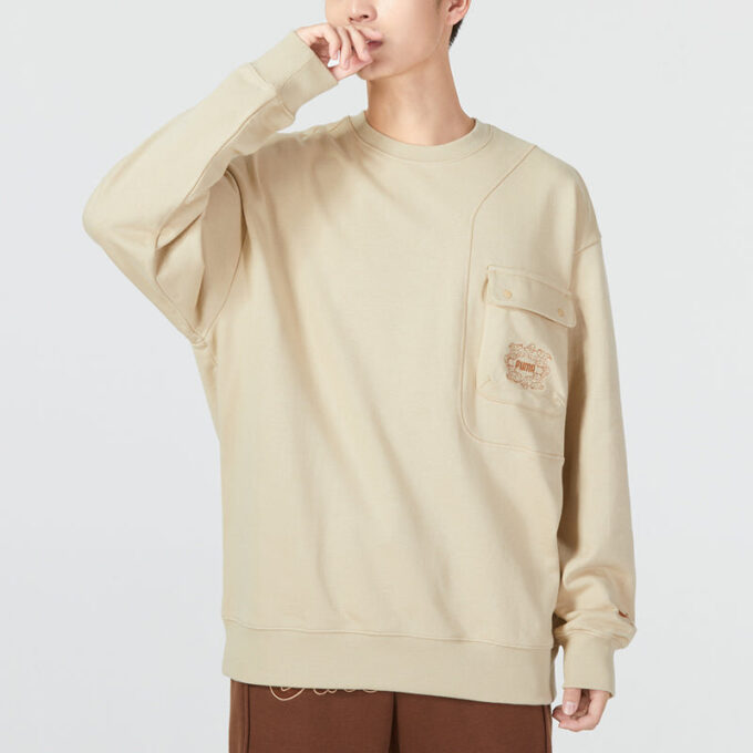 Suéter con cuello redondo y gráfico CC «Beige»