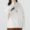 (WMNS) Camiseta de cuello redondo con media cremallera Das CC Graphic «Blanca»